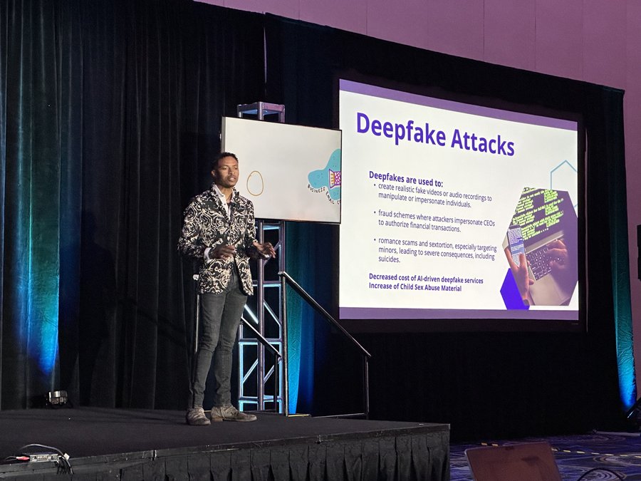 Corey White presenting on deepfake attacks