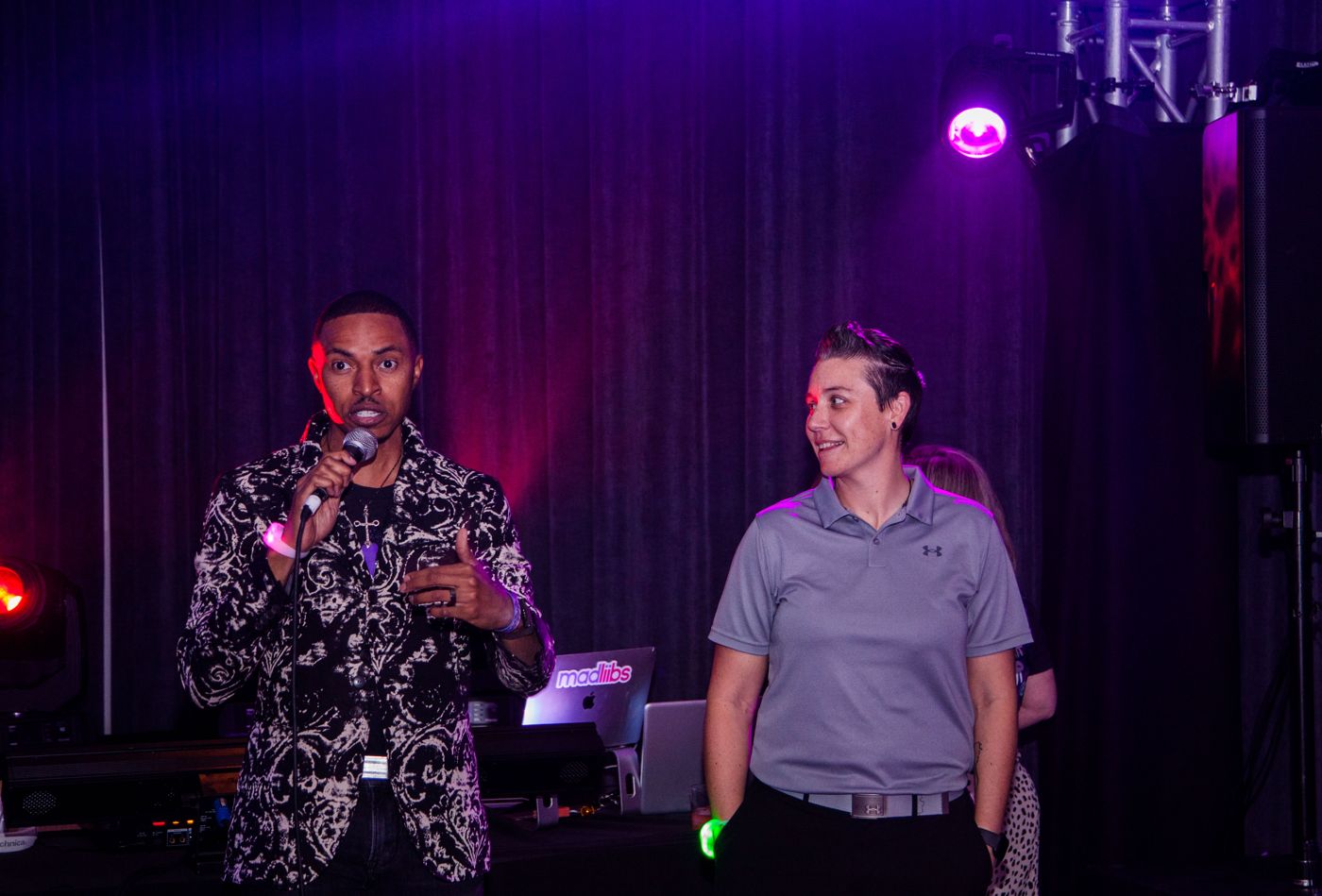 Corey White introducing a guest at the Cybrverse Experience