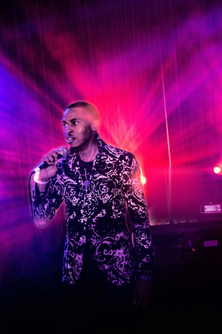 Corey White on the mic at the Cybrverse Experience